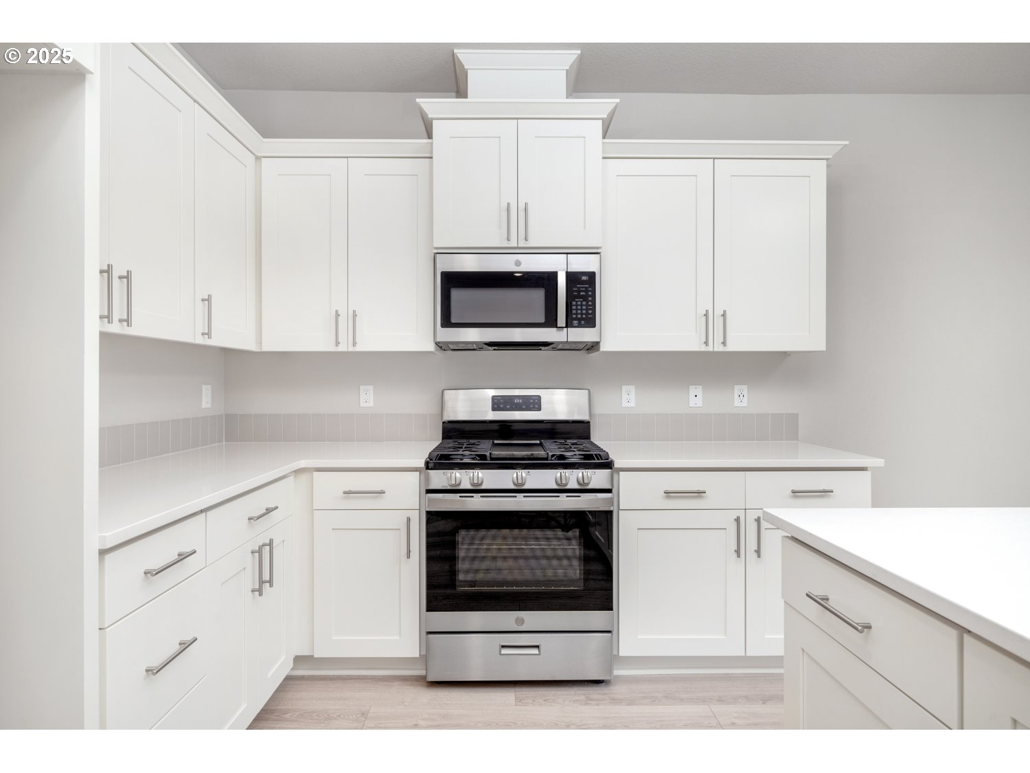 2833 South Heather Street, Unit LOT 850 Cornelius, OR 97113 - Photo 24 of 24 a kitchen with white cabinets and appliances