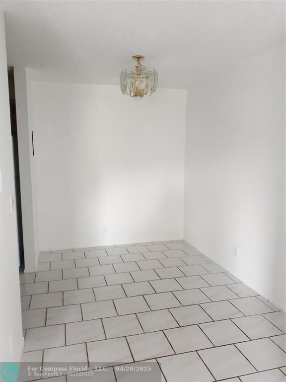 Undisclosed Address Coral Springs, FL 33065 - Photo 5 of 13 a view of empty room