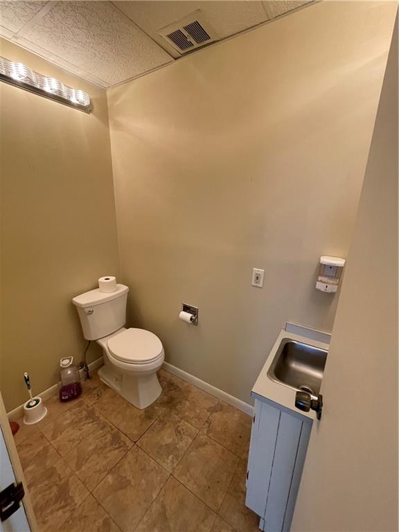 259 Pittsburgh Road, Unit 8 Butler, PA 16002 - Photo 9 of 9 a bathroom with a toilet and a shower