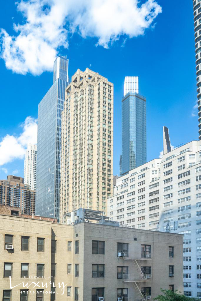 310 West 52nd Street, Unit 5J Manhattan, NY 10019 - Photo 3 of 16 a front view of a building