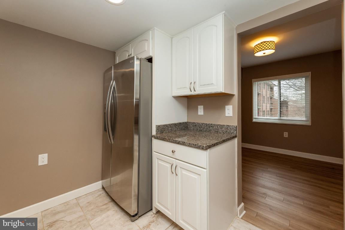 1405 Northgate Square, Unit 11C Reston, VA 20190 - Photo 6 of 31 SS Appliances & Granite Counters