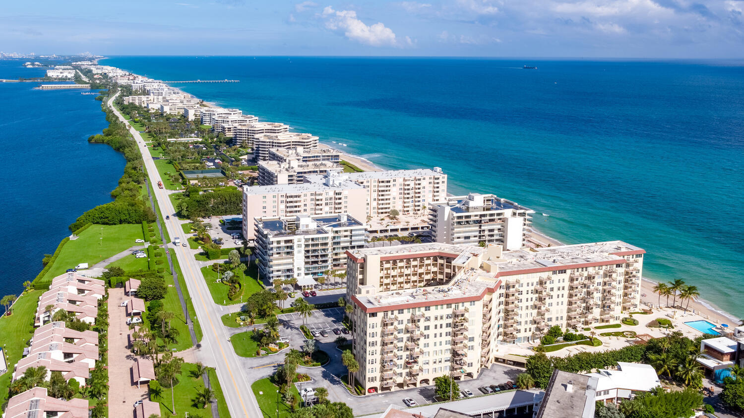 3475 South Ocean Boulevard, Unit 2160 Palm Beach, FL 33480 - Photo 1 of 54 a view of swimming pool with outdoor seating and city view
