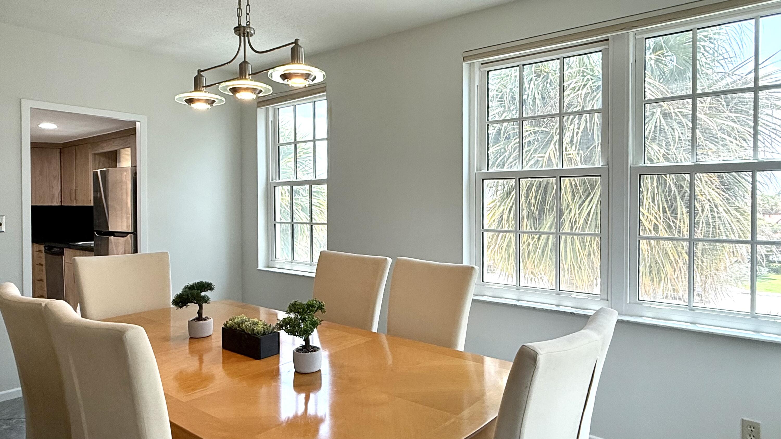 3475 South Ocean Boulevard, Unit 2160 Palm Beach, FL 33480 - Photo 14 of 54 a view of a dining room with furniture window and outside view