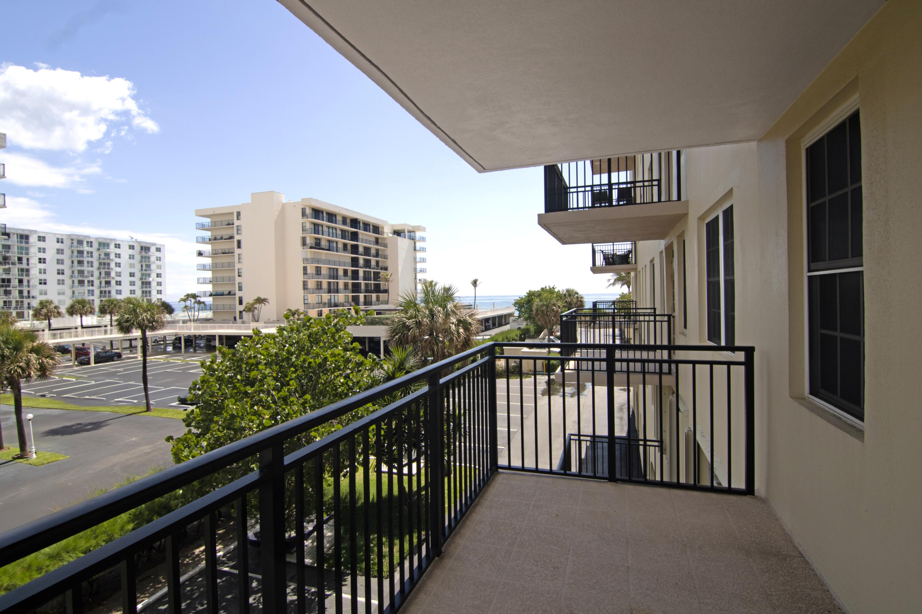 3475 South Ocean Boulevard, Unit 2160 Palm Beach, FL 33480 - Photo 34 of 54 a view of a balcony with city view