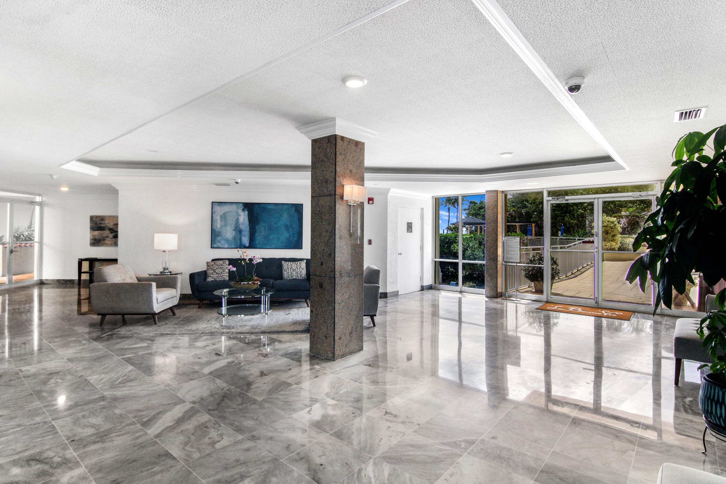 3475 South Ocean Boulevard, Unit 2160 Palm Beach, FL 33480 - Photo 36 of 54 a living room with furniture and a large window