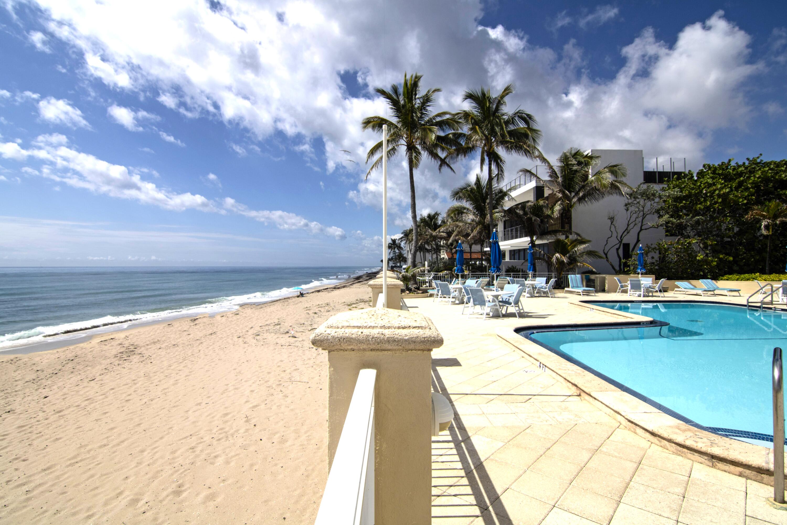3475 South Ocean Boulevard, Unit 2160 Palm Beach, FL 33480 - Photo 4 of 54 a view of swimming pool with outdoor seating and plants