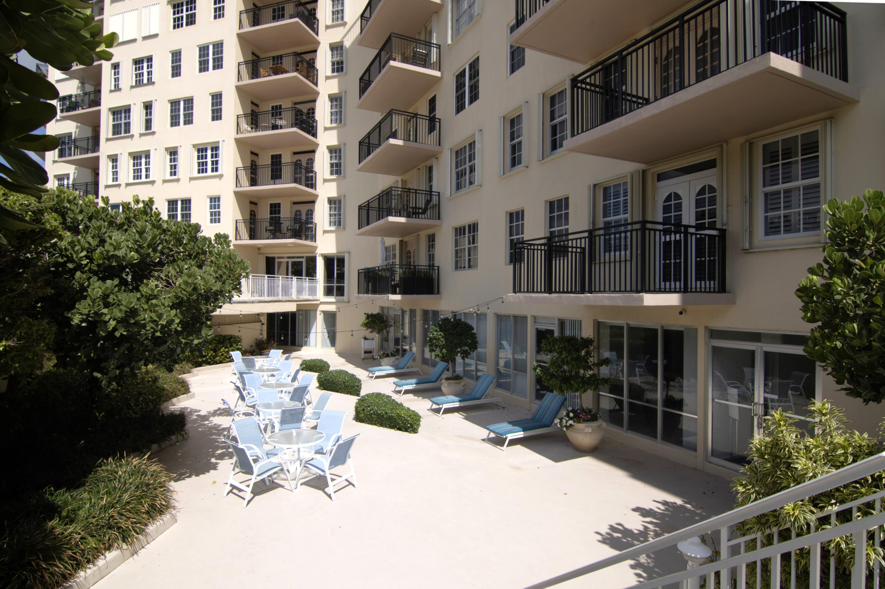 3475 South Ocean Boulevard, Unit 2160 Palm Beach, FL 33480 - Photo 44 of 54 a view of a building with sitting area