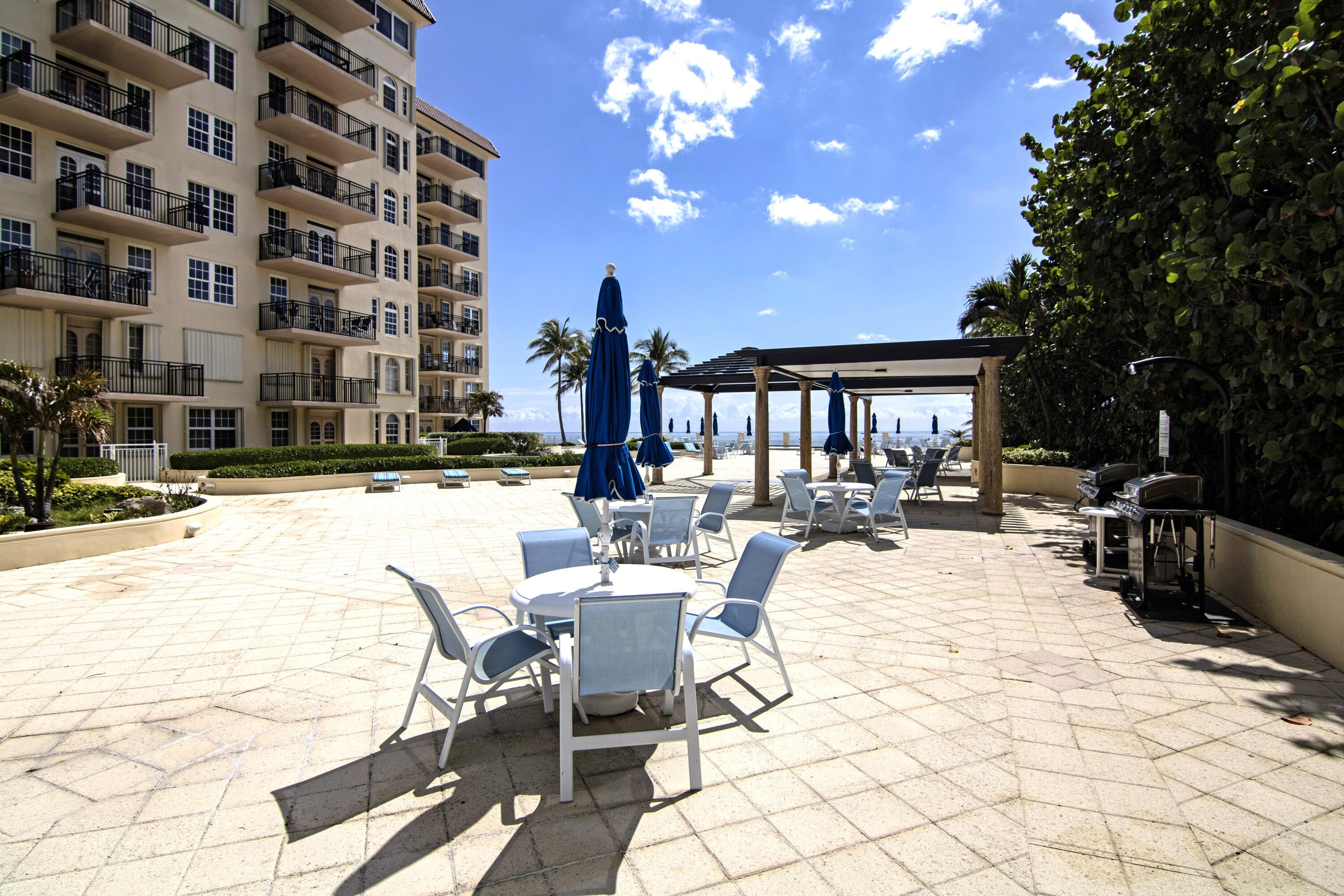 3475 South Ocean Boulevard, Unit 2160 Palm Beach, FL 33480 - Photo 47 of 54 a view of a swimming pool and outdoor space