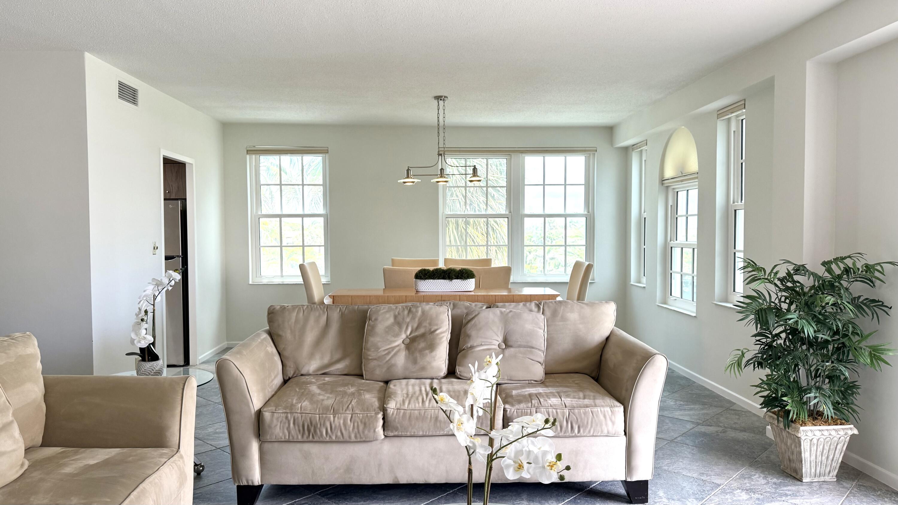 3475 South Ocean Boulevard, Unit 2160 Palm Beach, FL 33480 - Photo 8 of 54 a living room with furniture and a large window