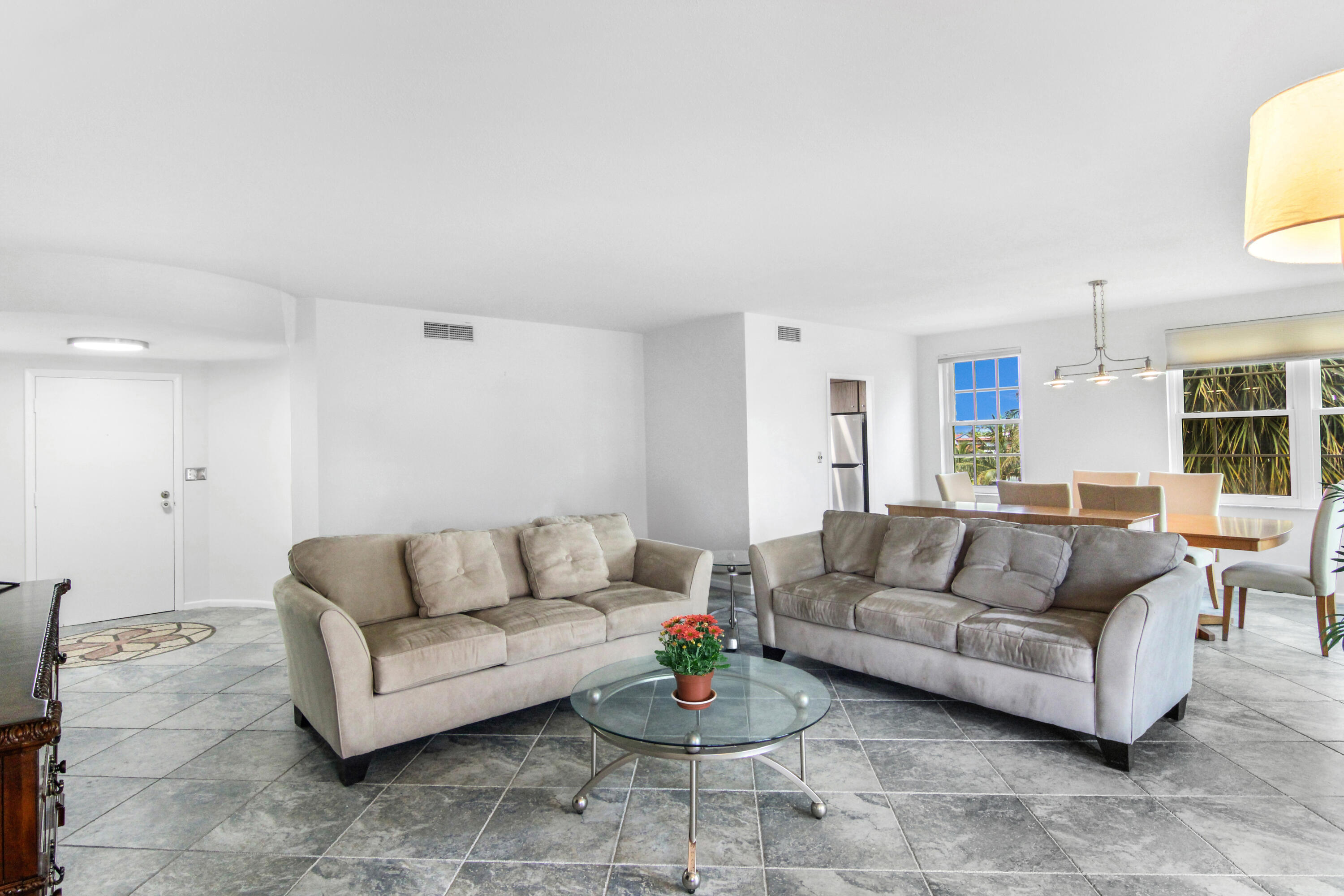 3475 South Ocean Boulevard, Unit 2160 Palm Beach, FL 33480 - Photo 10 of 54 a living room with furniture and a couch