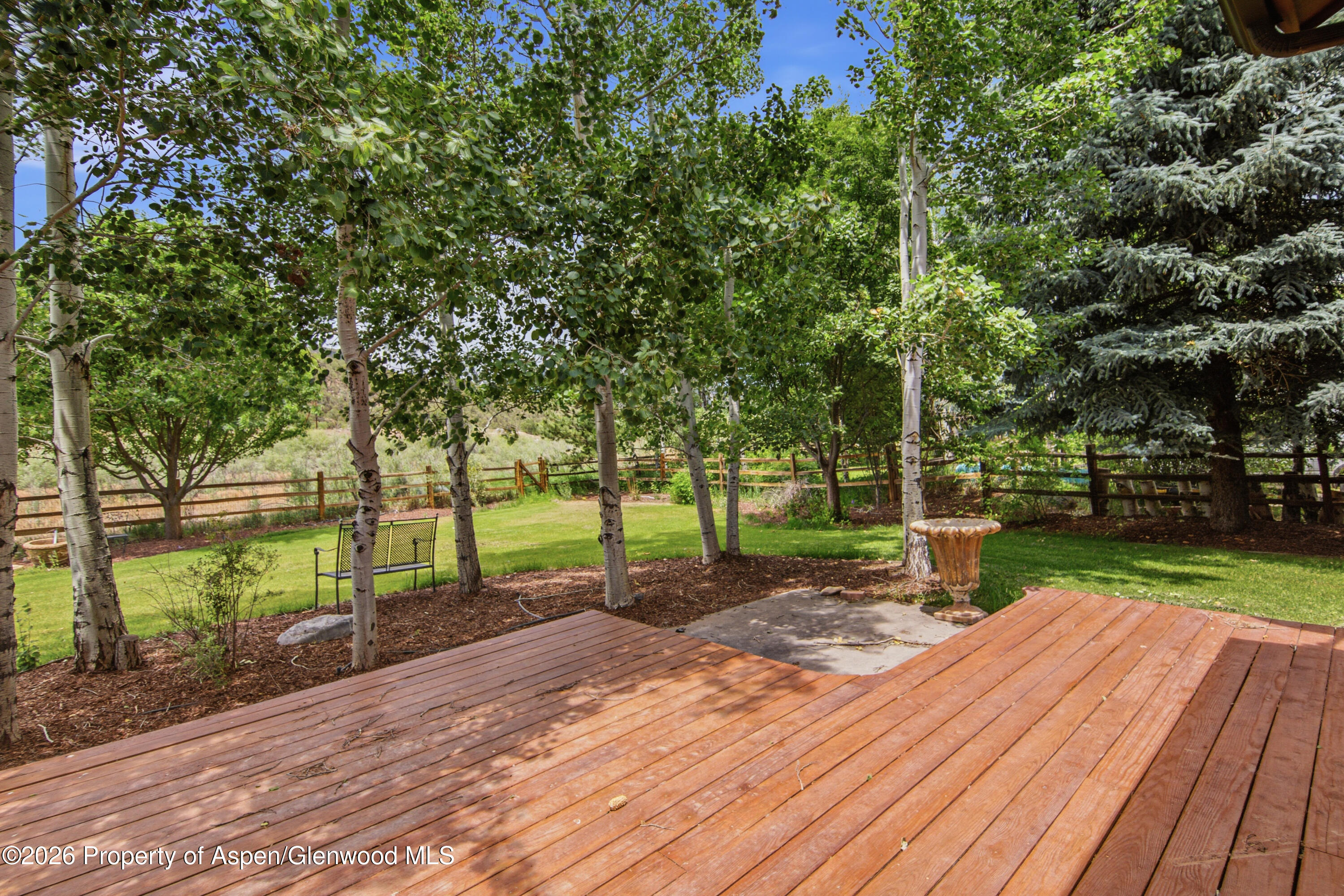 33 Iron Horse Road Carbondale, CO 81623 - Photo 4 of 16 back yard patio