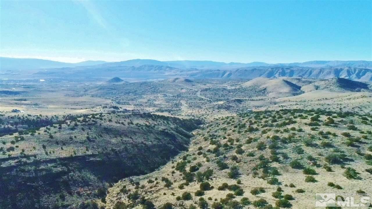 a view of mountains and valleys