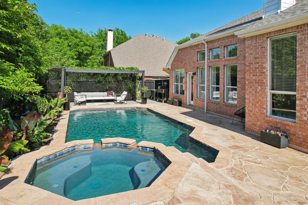 1504 Rustic Timbers Lane Flower Mound, TX 75028 - Photo 1 of 1 a view of outdoor space yard deck patio and swimming pool
