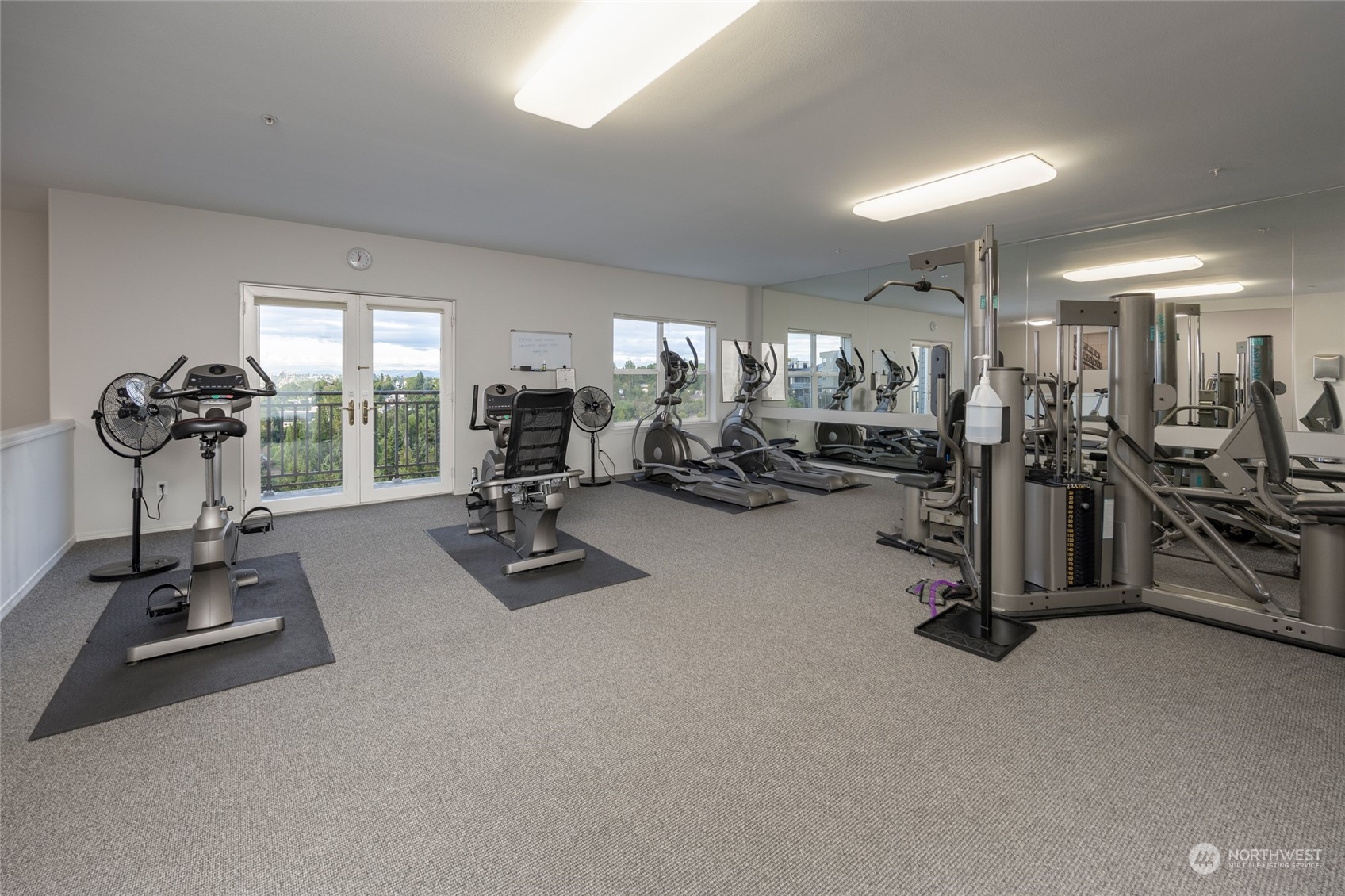3221 Southwest Avalon Way, Unit 305 Seattle, WA 98126 - Photo 30 of 40 a view of a room with gym equipment