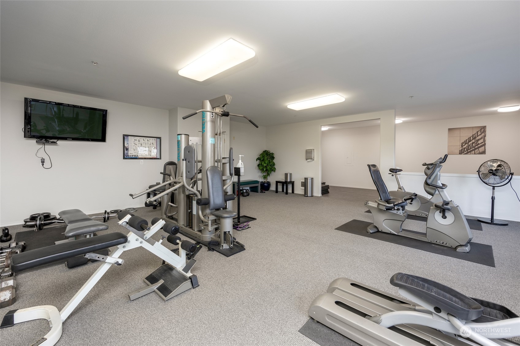 3221 Southwest Avalon Way, Unit 305 Seattle, WA 98126 - Photo 31 of 40 a view of a room with gym equipment