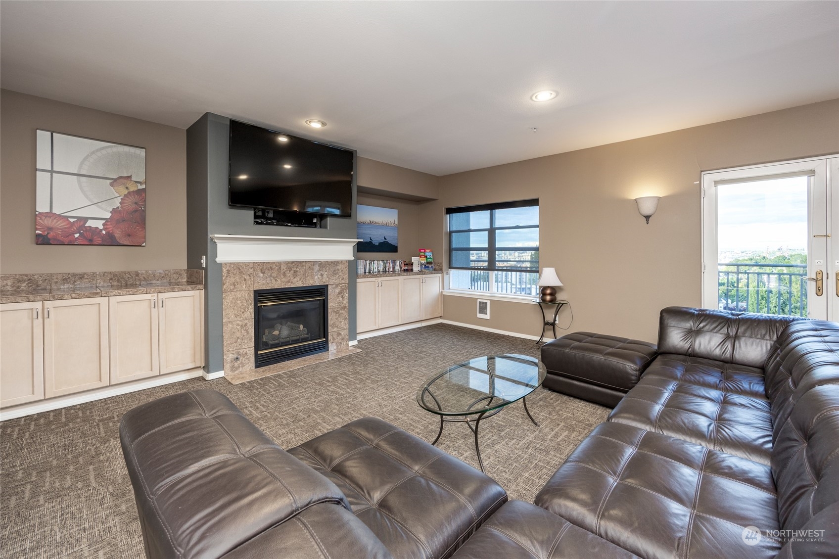 3221 Southwest Avalon Way, Unit 305 Seattle, WA 98126 - Photo 35 of 40 a living room with furniture and a fireplace