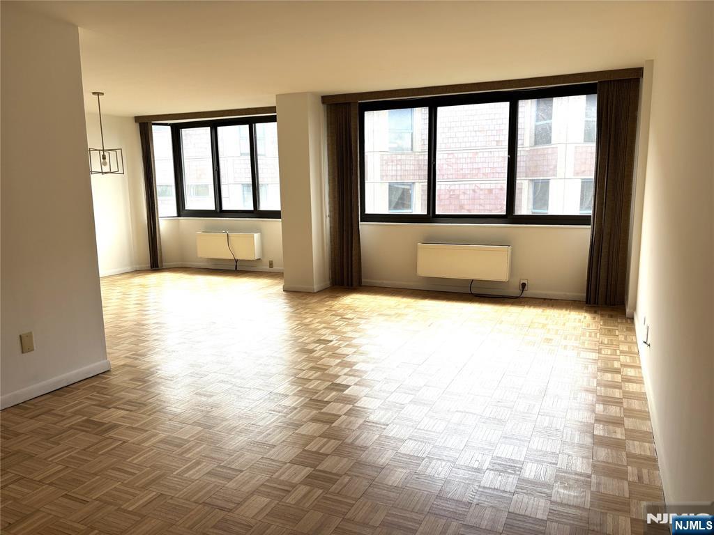 344 Prospect Avenue, Unit 9G Hackensack, NJ 07601 - Photo 16 of 16 a view of an empty room with a window