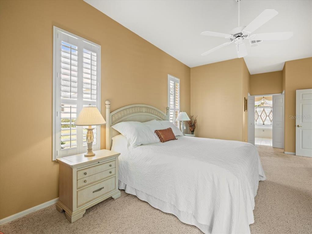 9216 Tarleton Circle Weeki Wachee, FL 34613 - Photo 18 of 66 a bedroom with a bed and a window