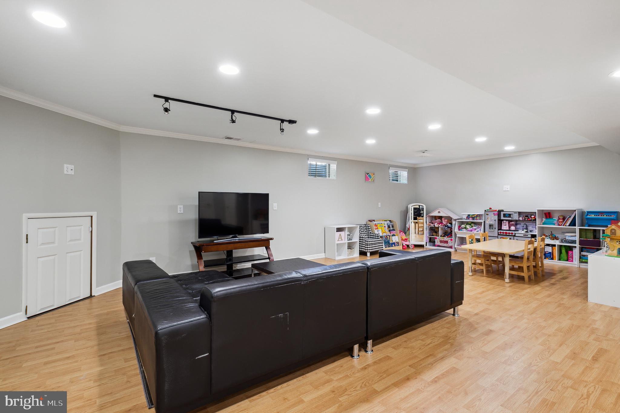 339 Watkins Road Pennington, NJ 08534 - Photo 22 of 32 a living room with furniture and a flat screen tv