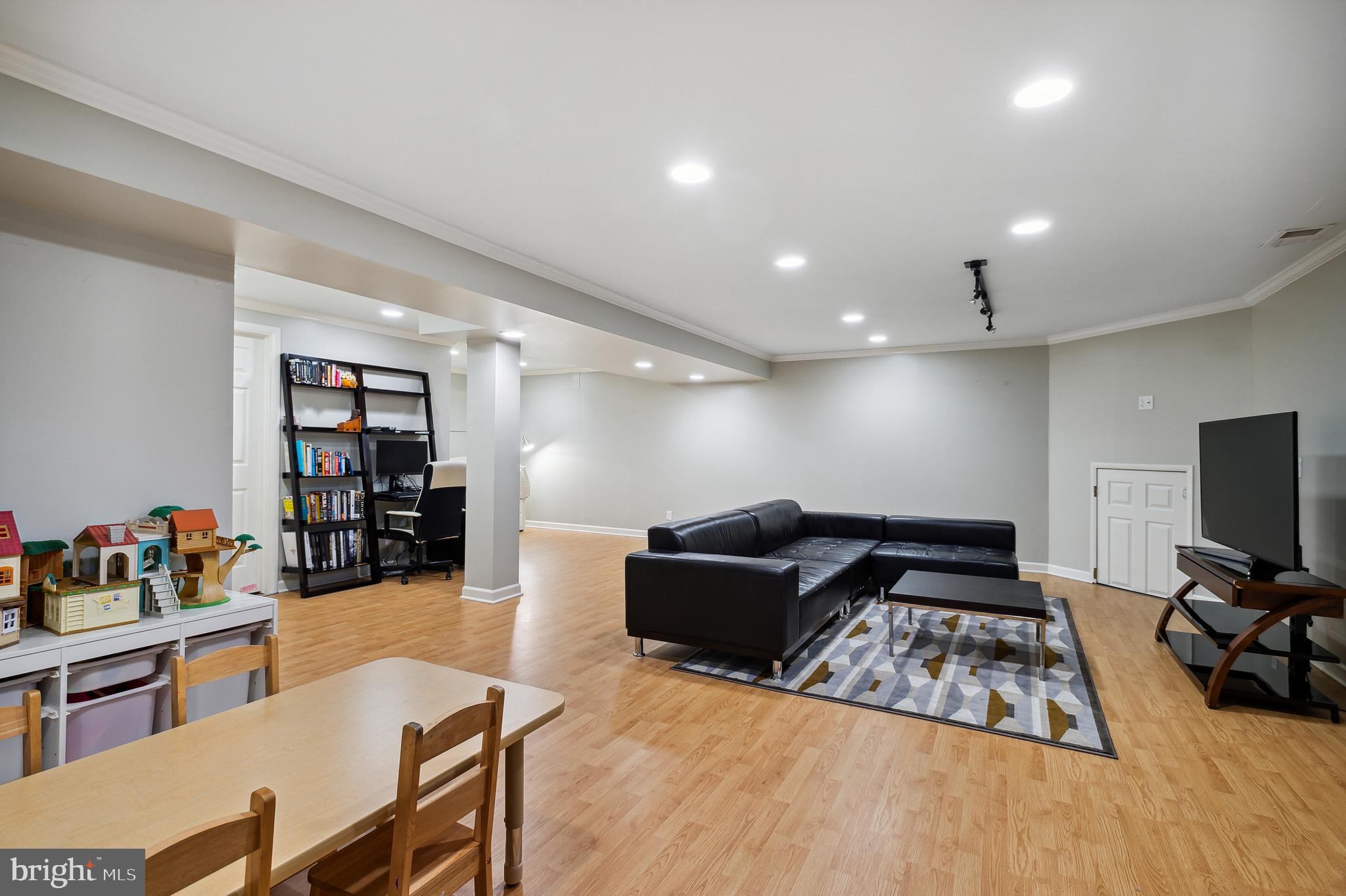 339 Watkins Road Pennington, NJ 08534 - Photo 23 of 32 a living room with furniture and a wooden floor