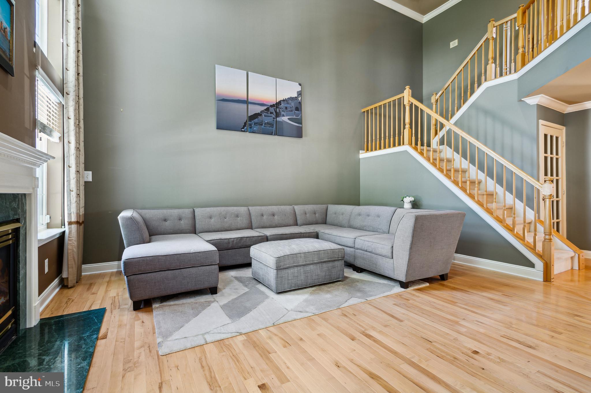 339 Watkins Road Pennington, NJ 08534 - Photo 6 of 32 a living room with fireplace furniture and a wooden floor