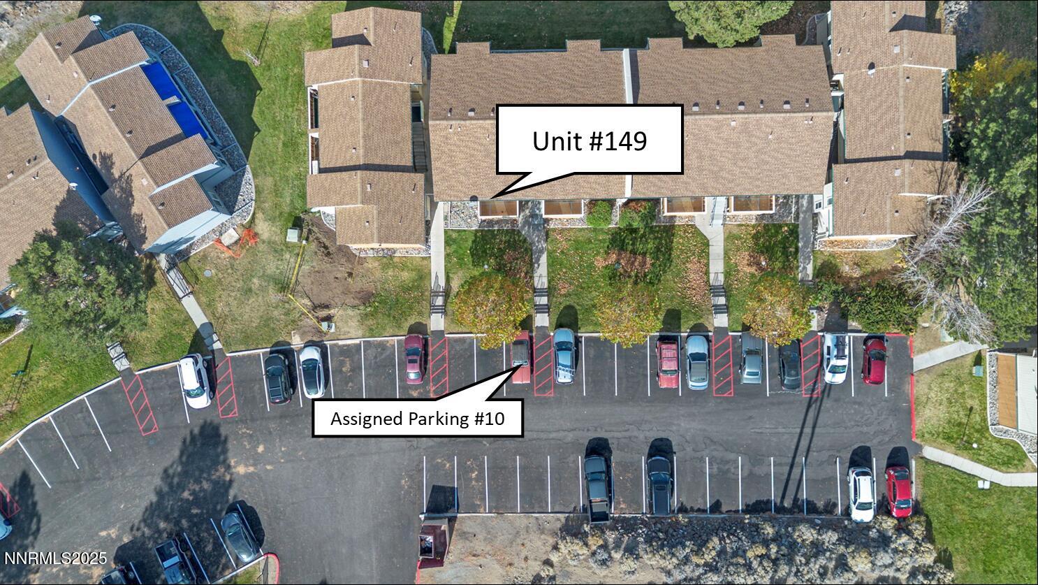 3915 Clear Acre Lane, Unit 149 Reno, NV 89512 - Photo 15 of 16 an outdoor space with seating area and sign board