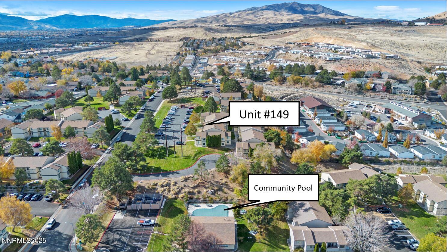 3915 Clear Acre Lane, Unit 149 Reno, NV 89512 - Photo 16 of 16 a view of a city with lots of residential buildings and mountain view in back