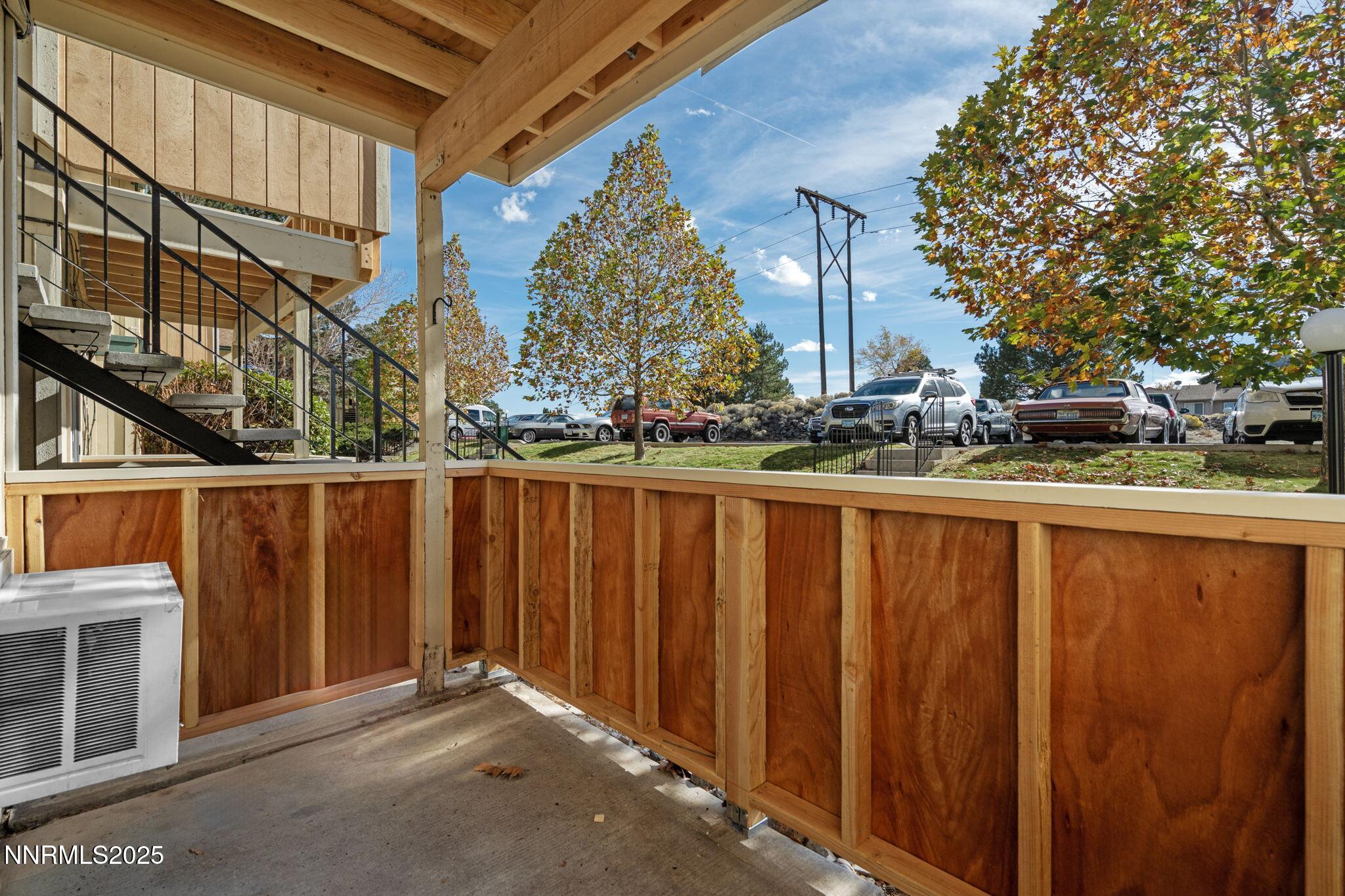 3915 Clear Acre Lane, Unit 149 Reno, NV 89512 - Photo 7 of 16 a view of a building with wooden fence