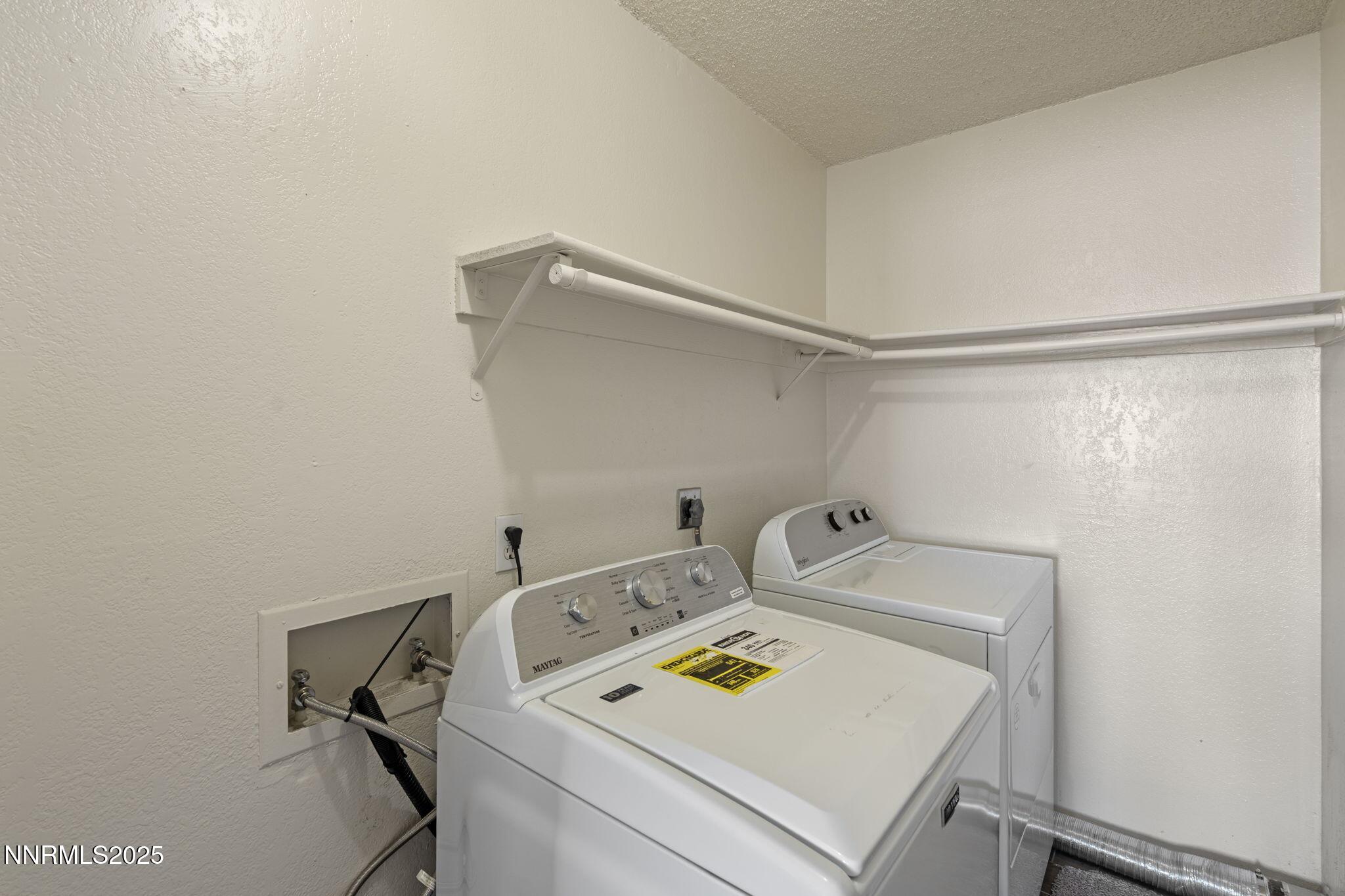 3915 Clear Acre Lane, Unit 149 Reno, NV 89512 - Photo 8 of 16 a utility room with dryer and washer