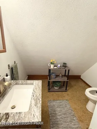 a living room with a couch and a table