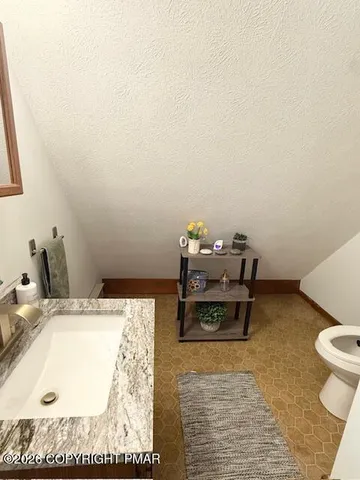 a living room with a couch and a table