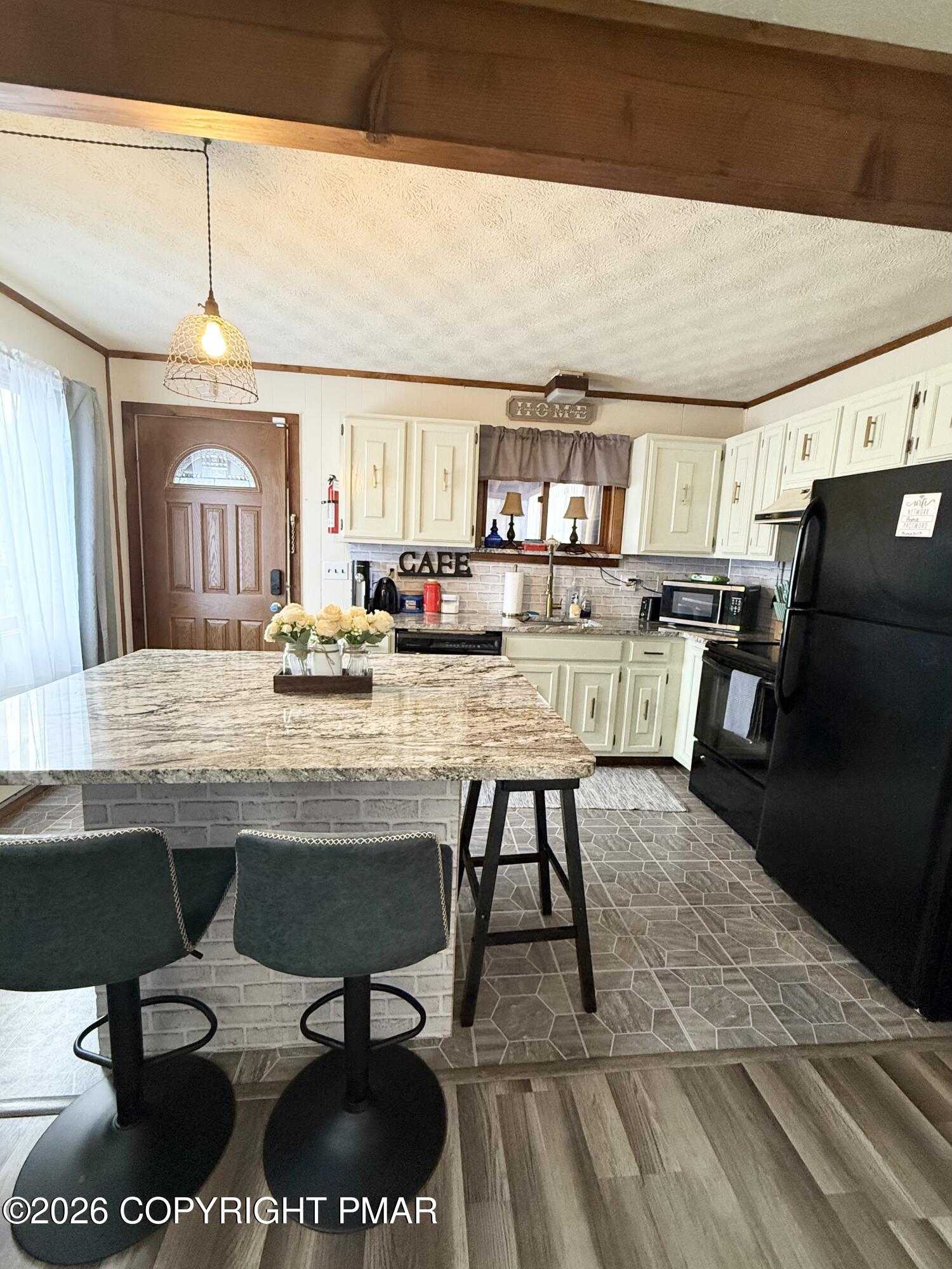 1037 Porter Drive Bushkill, PA 18324 - Photo 5 of 17 a view of a dining room with furniture