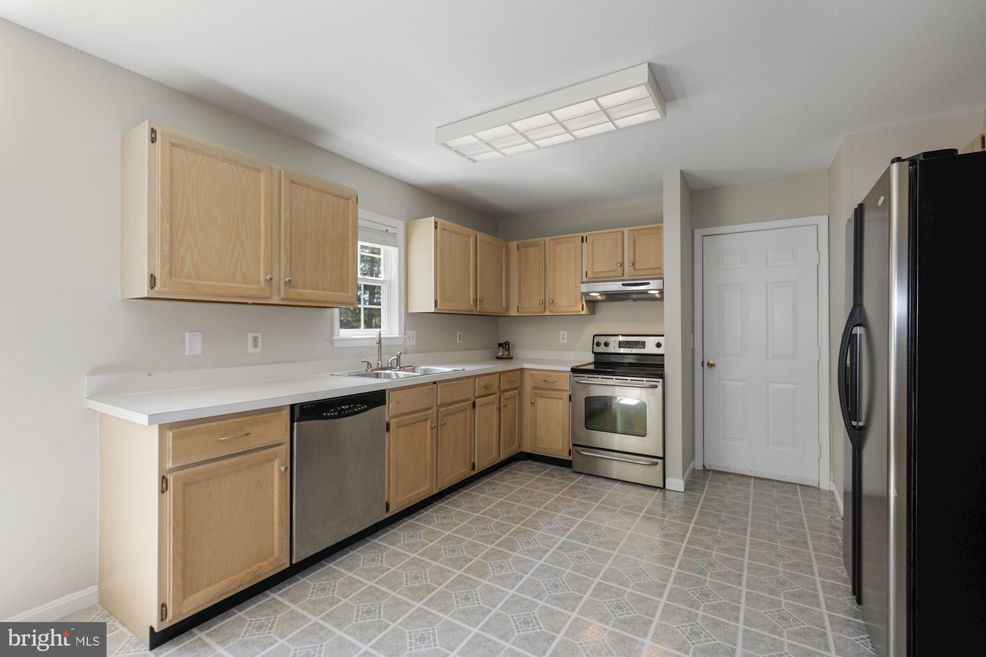 24 Port Royal Road Ocean View, DE 19970 - Photo 11 of 39 Open Kitchen | Stainless Steel Appliances