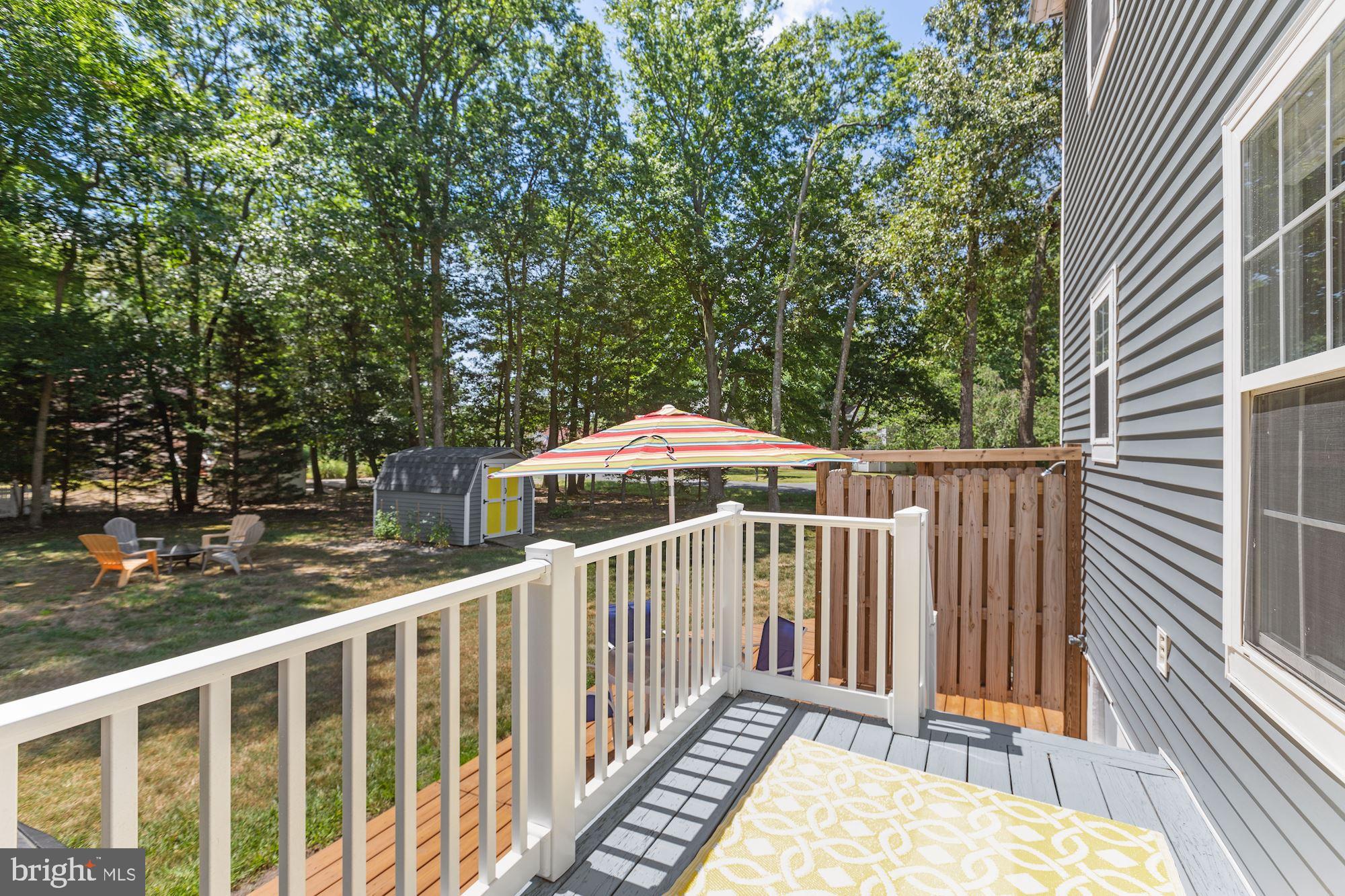 24 Port Royal Road Ocean View, DE 19970 - Photo 19 of 39 Deck Overlooking Rear Yard