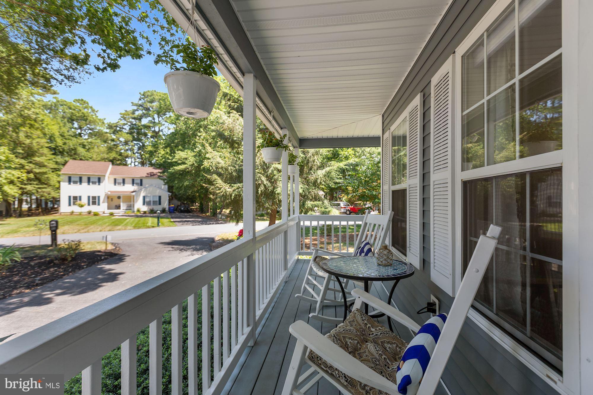24 Port Royal Road Ocean View, DE 19970 - Photo 4 of 39 Inviting Wrap Around Front Porch