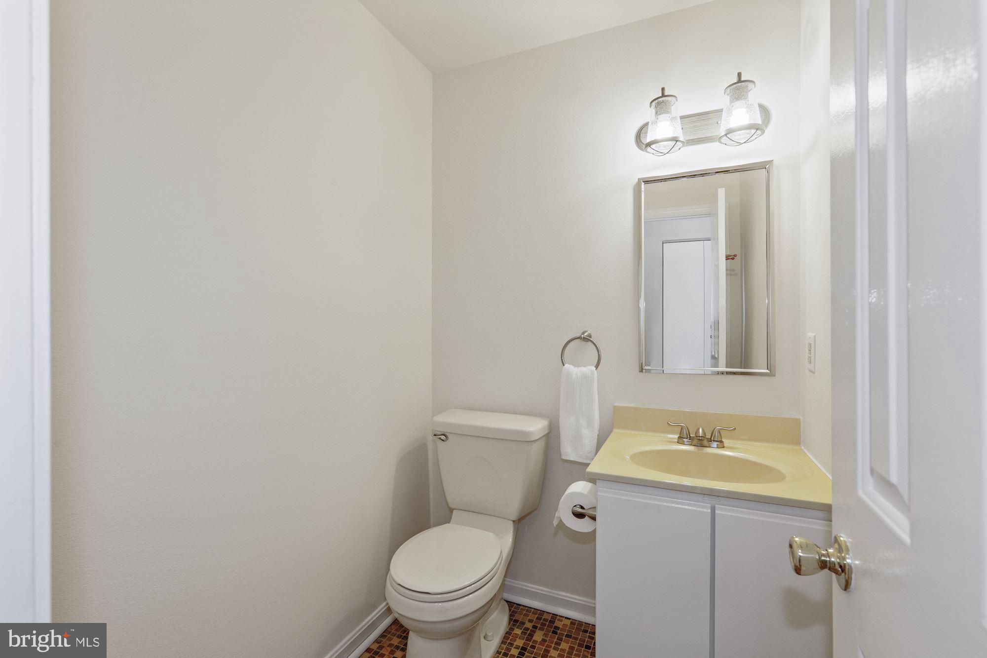 24 Port Royal Road Ocean View, DE 19970 - Photo 9 of 39 Main Level Powder Room