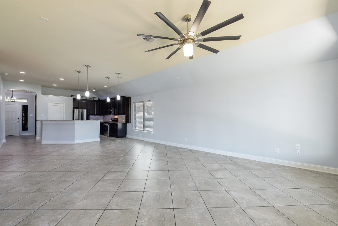 1908 Rushing Meadow Lane Pearland, TX 77089 - Photo 17 of 31 Great tile flooring & large ceiling fan.