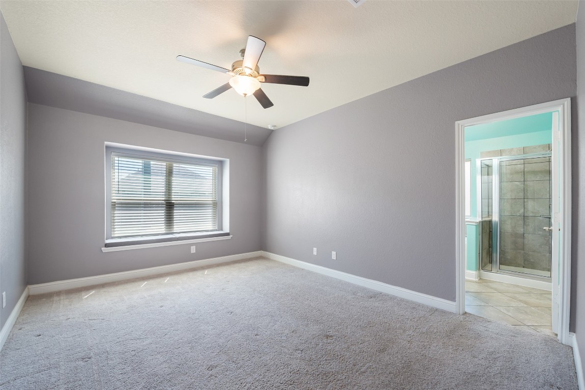 1908 Rushing Meadow Lane Pearland, TX 77089 - Photo 19 of 31 Nicely sized primary bedroom.