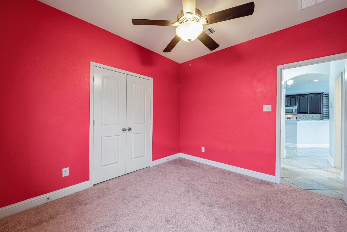 1908 Rushing Meadow Lane Pearland, TX 77089 - Photo 25 of 31 Secondary bedroom.
