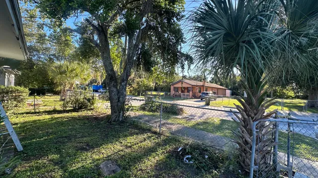 a view of swimming pool with a garden