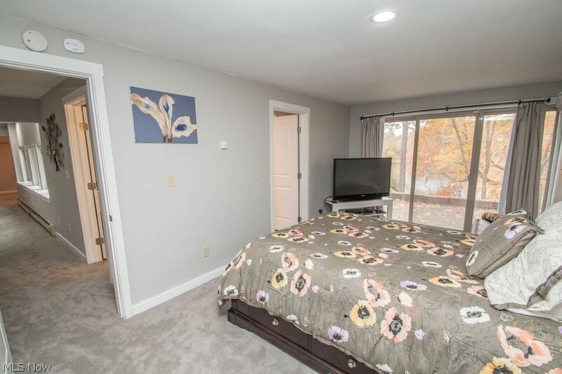 1007 Stewart Road Kent, OH 44240 - Photo 18 of 35 Another view of bedroom on lower level with door to full bath.
