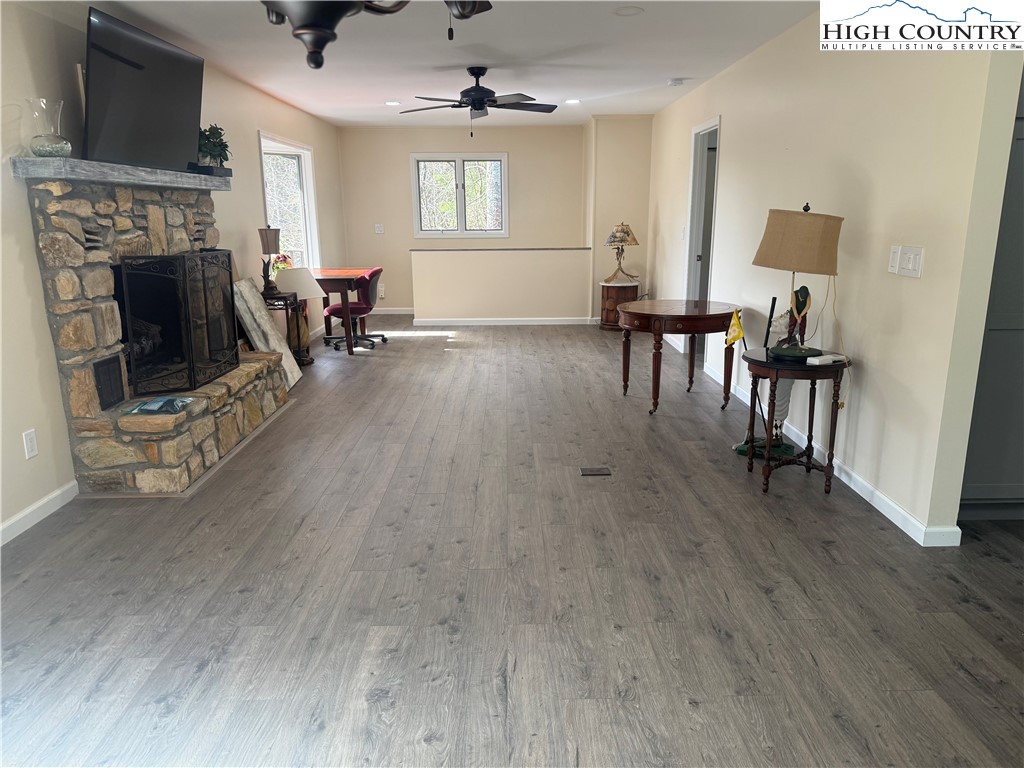 174 Spruce Pine Road Newland, NC 28657 - Photo 16 of 41 a view of a livingroom with furniture and a fireplace