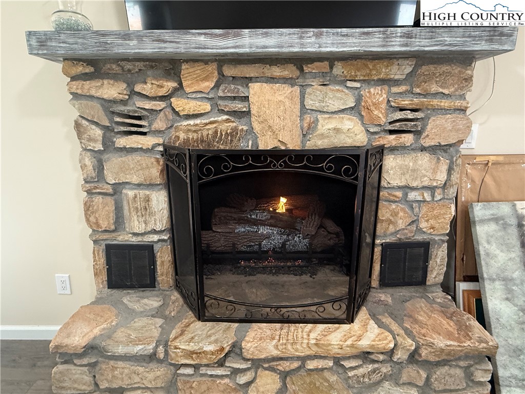 174 Spruce Pine Road Newland, NC 28657 - Photo 17 of 41 a living room with a fireplace