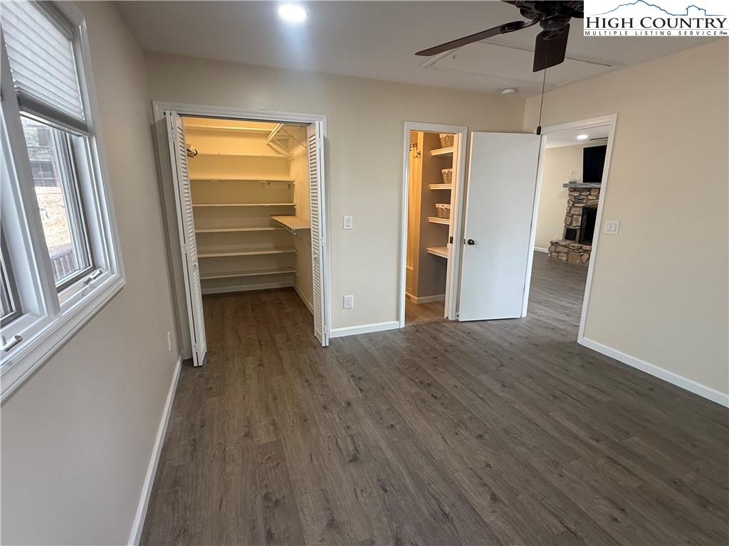 174 Spruce Pine Road Newland, NC 28657 - Photo 21 of 41 a view of walk in closet with empty racks