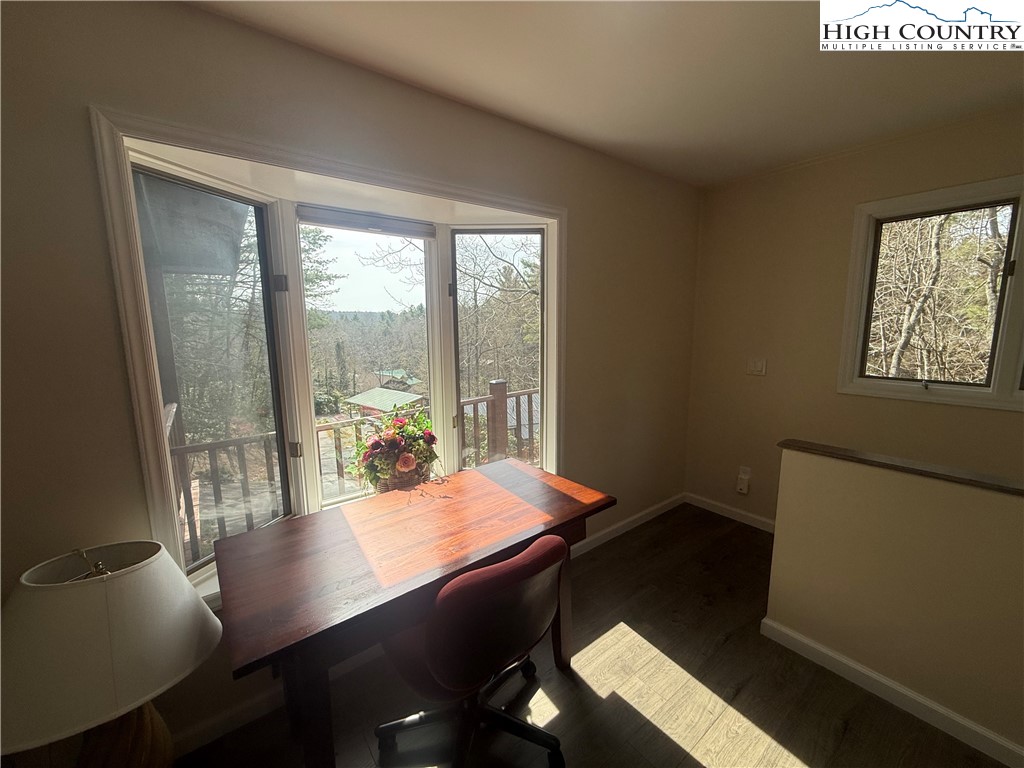 174 Spruce Pine Road Newland, NC 28657 - Photo 23 of 41 a view of a workspace with furniture and a window