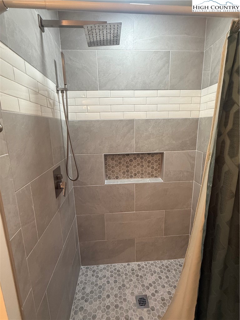 174 Spruce Pine Road Newland, NC 28657 - Photo 28 of 41 a bathroom with a shower