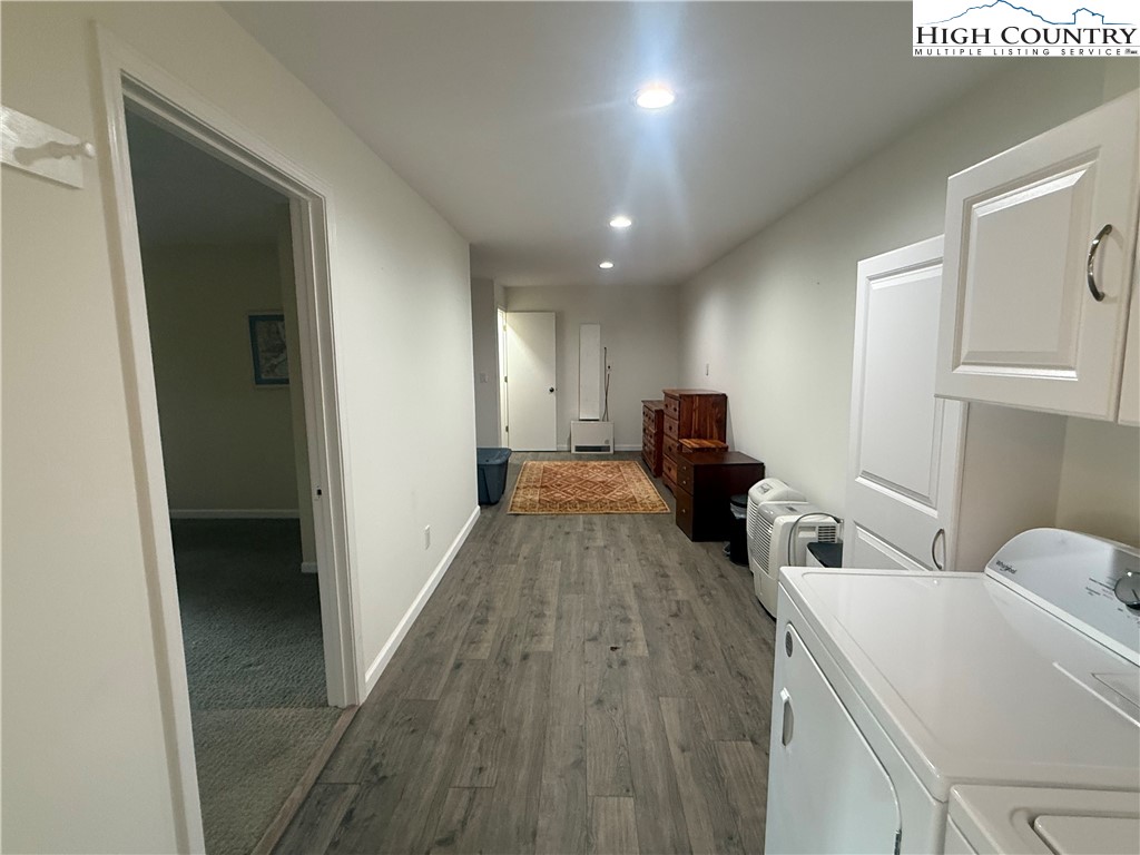 174 Spruce Pine Road Newland, NC 28657 - Photo 29 of 41 a living room with furniture and a wooden floor