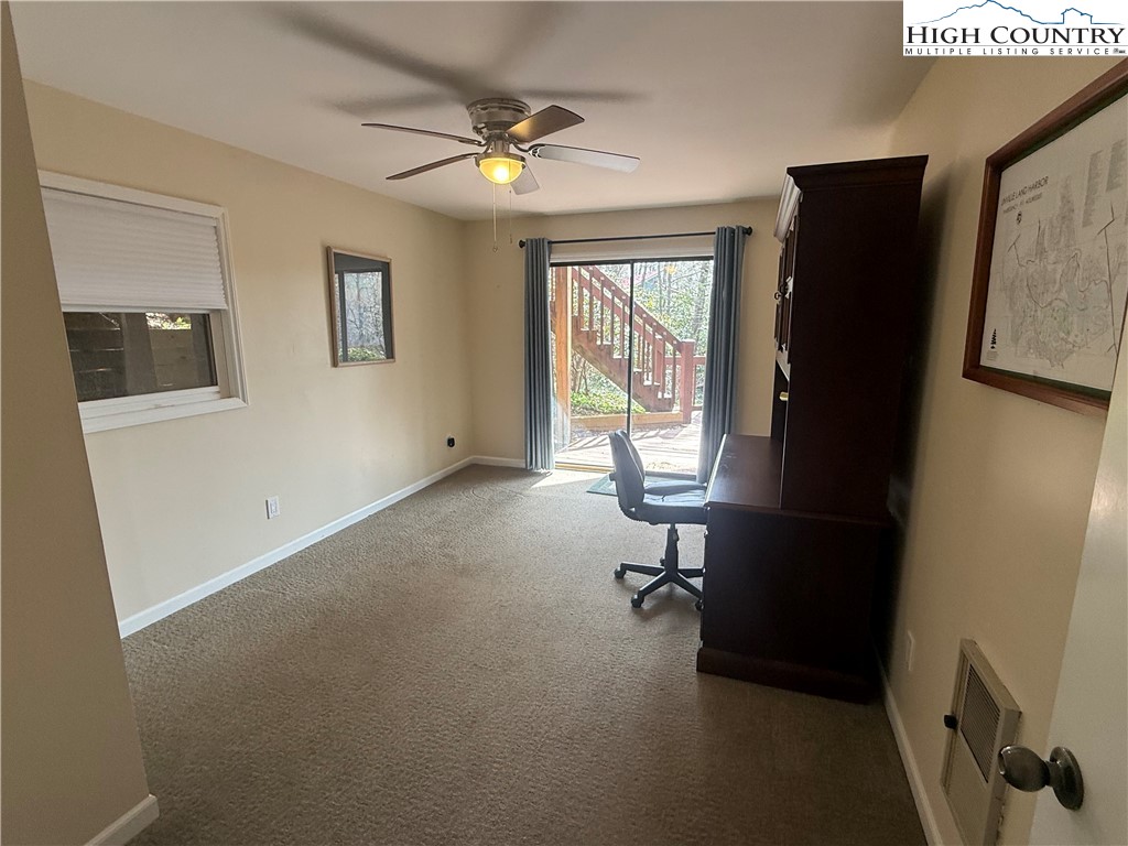 174 Spruce Pine Road Newland, NC 28657 - Photo 32 of 41 a view of a workspace with furniture and a window
