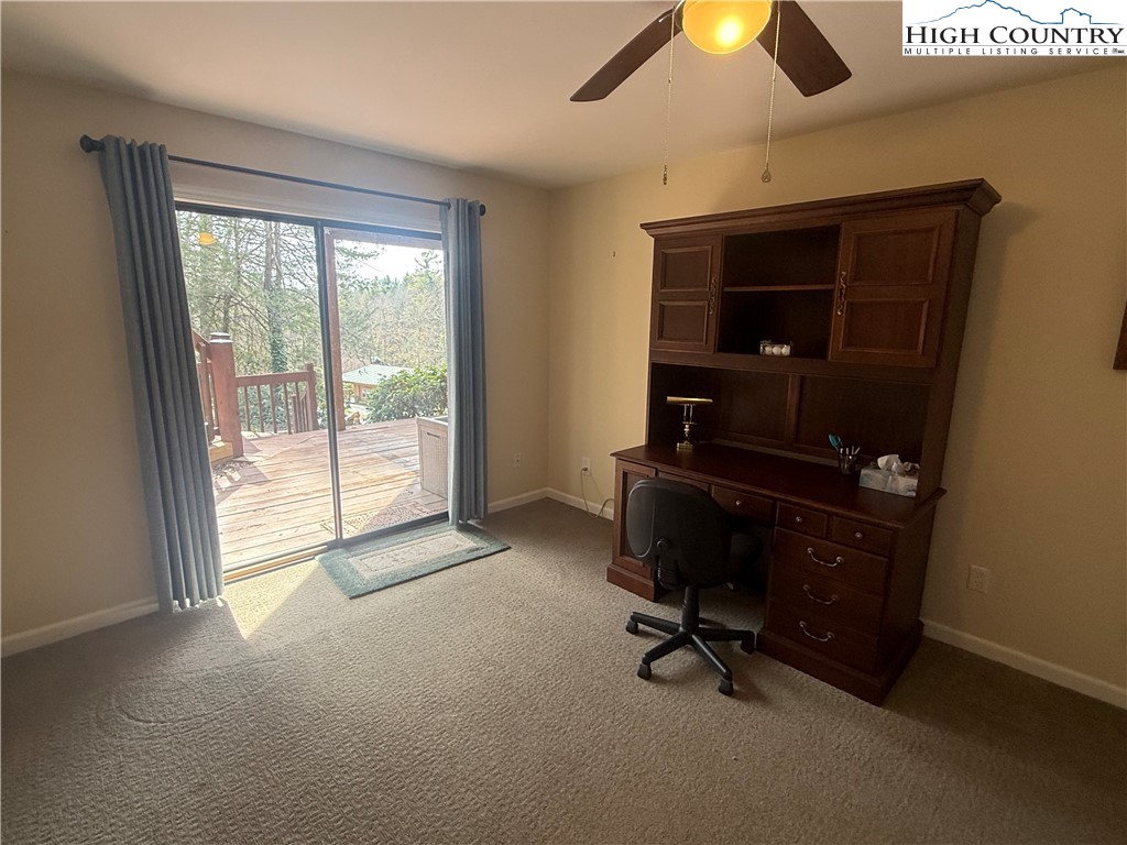 174 Spruce Pine Road Newland, NC 28657 - Photo 33 of 41 a view of a workspace with furniture and a window