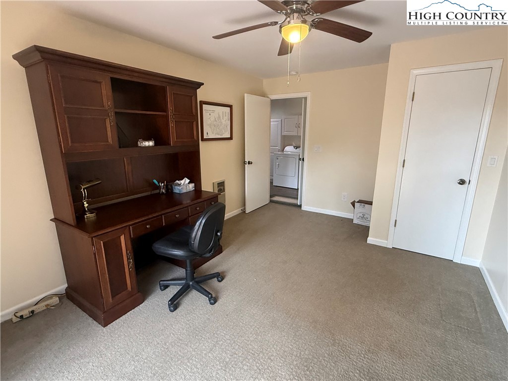 174 Spruce Pine Road Newland, NC 28657 - Photo 34 of 41 a living room with furniture and a ceiling fan